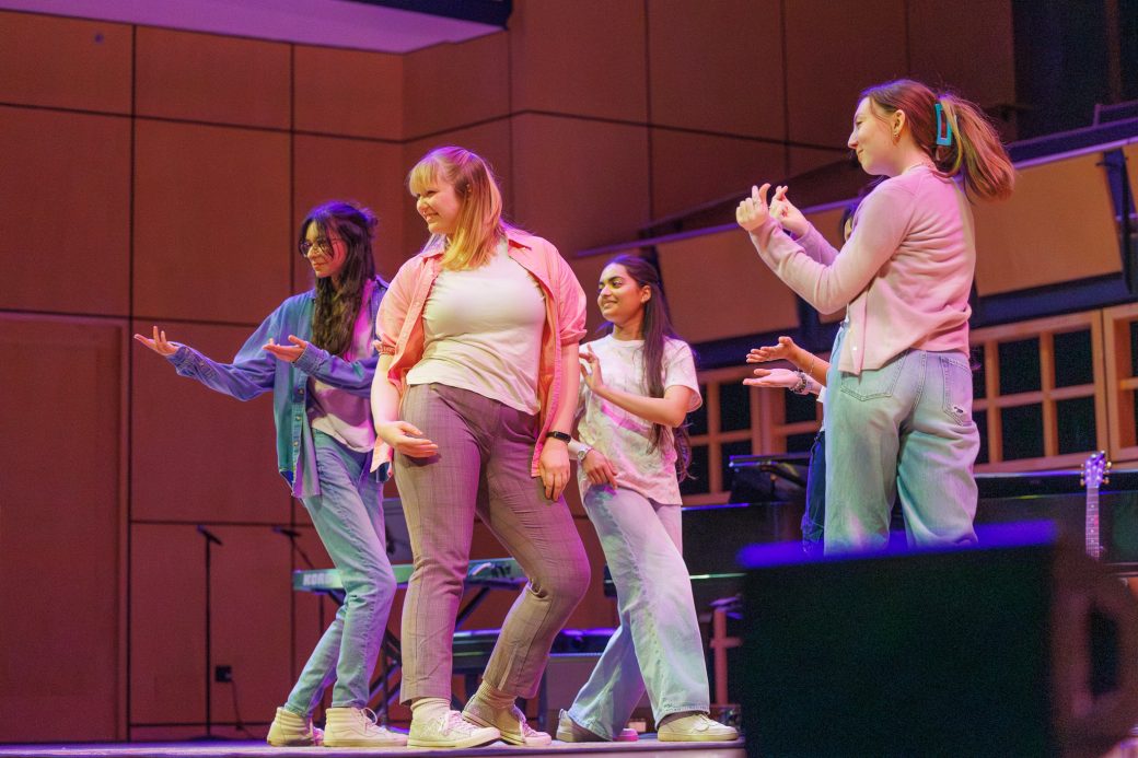 Group of women dance to kpop
