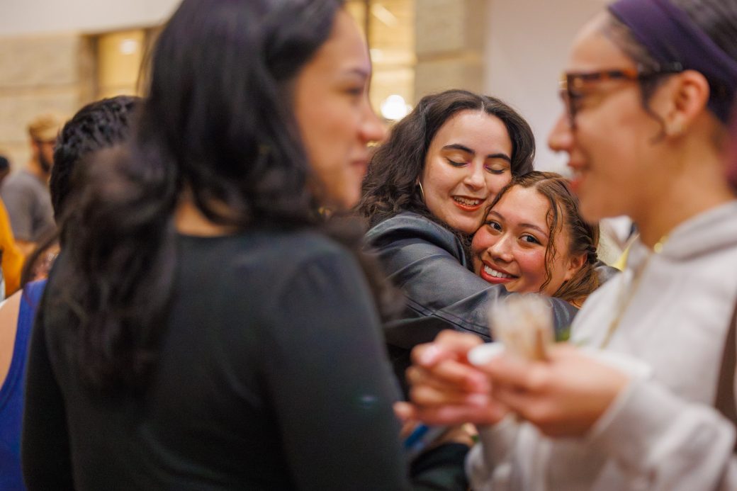Two friends hugging during baccalaureate reception