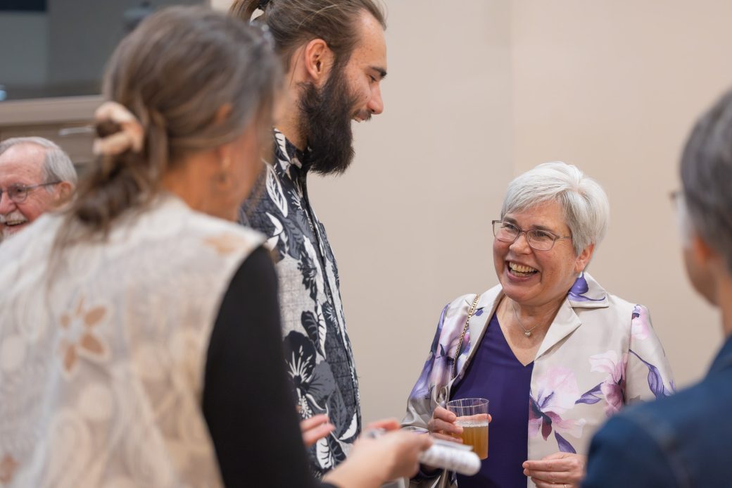 President Rebecca Stoltzfus talks to students during reception