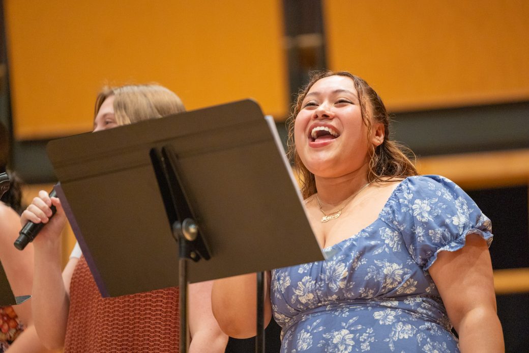 Student sings during baccalaureate