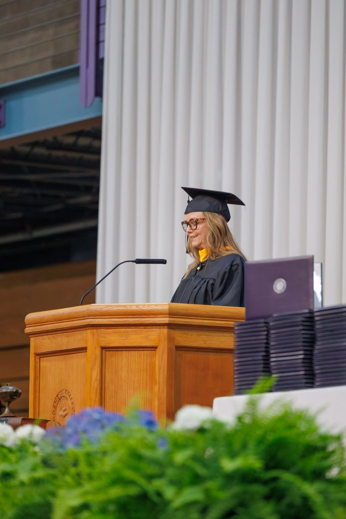 Shannan Martin speaking to graduates and guests during commencement