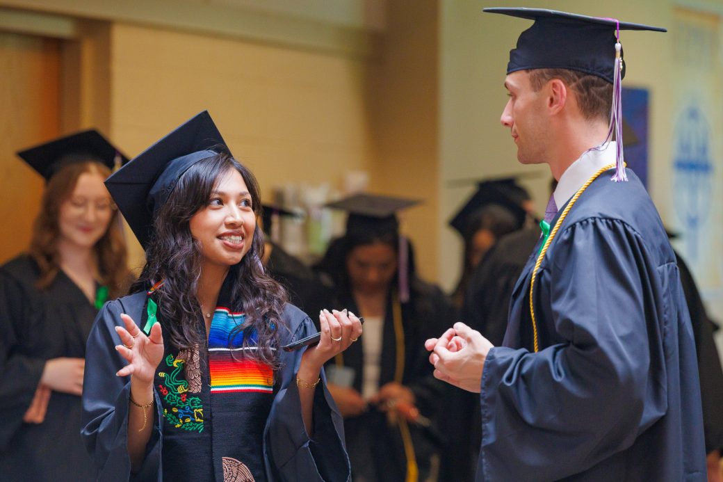 Female graduate being expressive with gestures