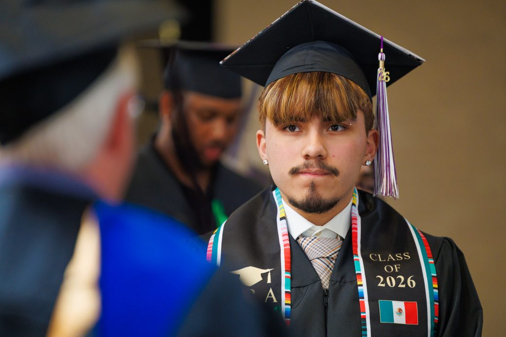 Closeup of a nervous hispanic male graduate