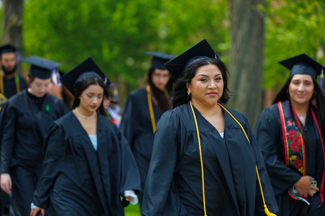 Hispanic female graduates walking