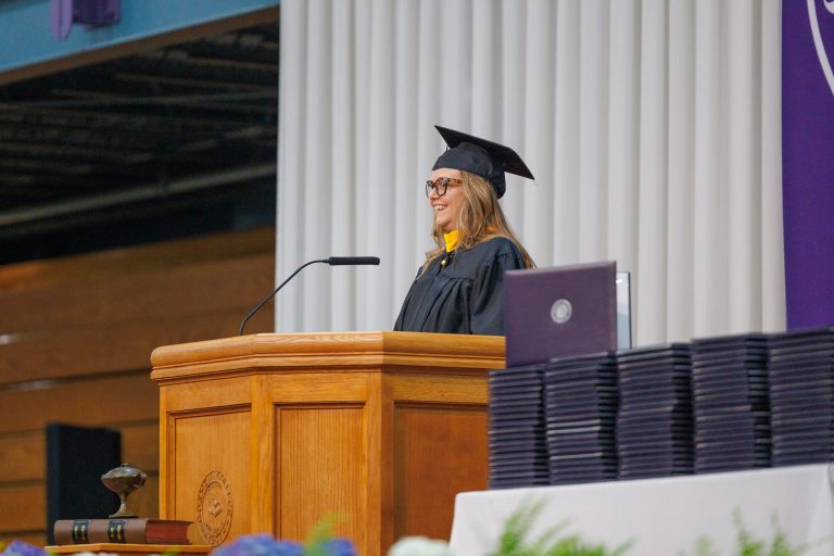 Shannan Martin speaking on stage at GC's graduation