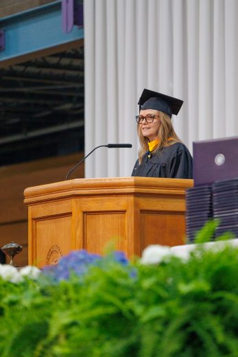 Shannan Martin speaking on stage at GC's graduation