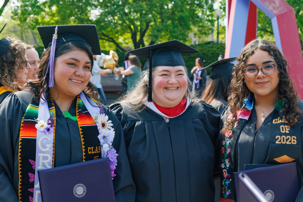 Graduates posed with faculty member