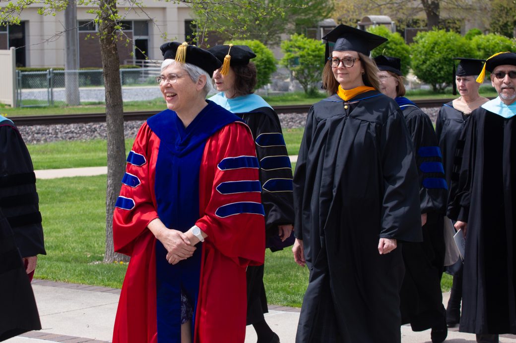 President Rebecca Stoltzfus with Shannan Martin heading into Roman Gingerich Recreation-Fitness Center