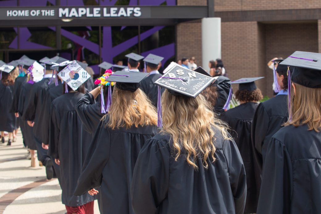 Group of graduates with mortarboards