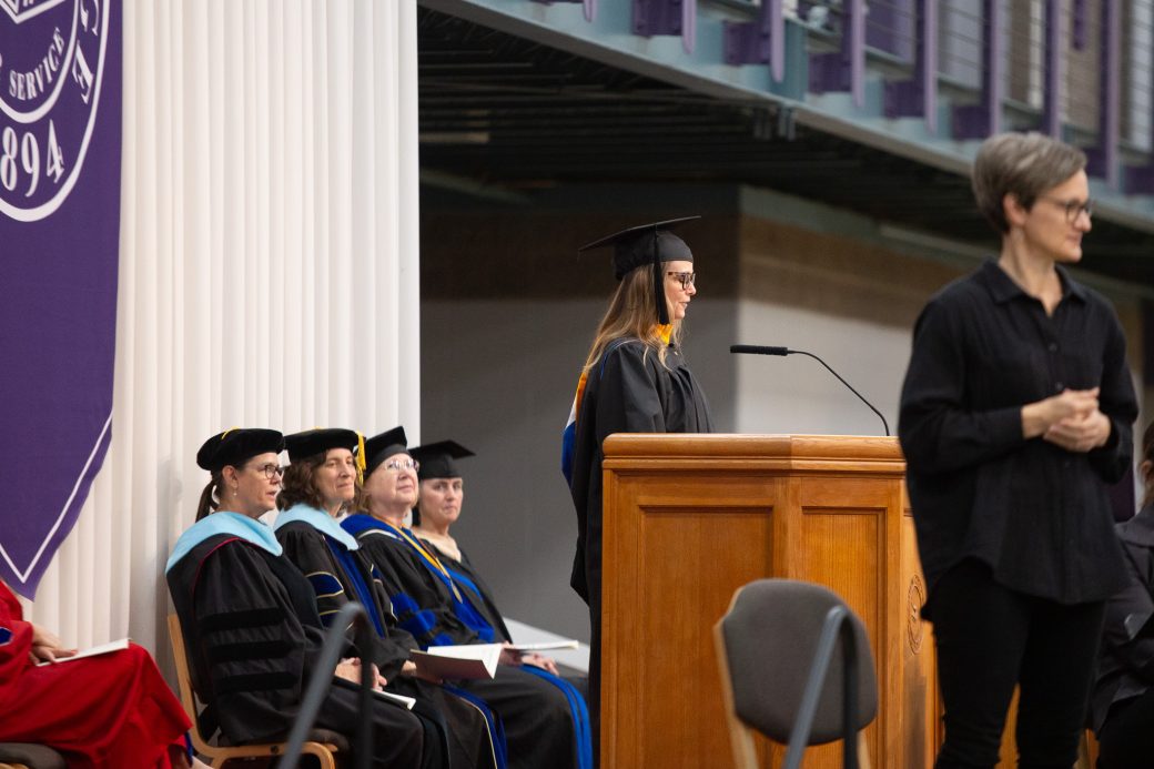 Shannan Martin delivering remarks during graduation ceremony at Goshen College
