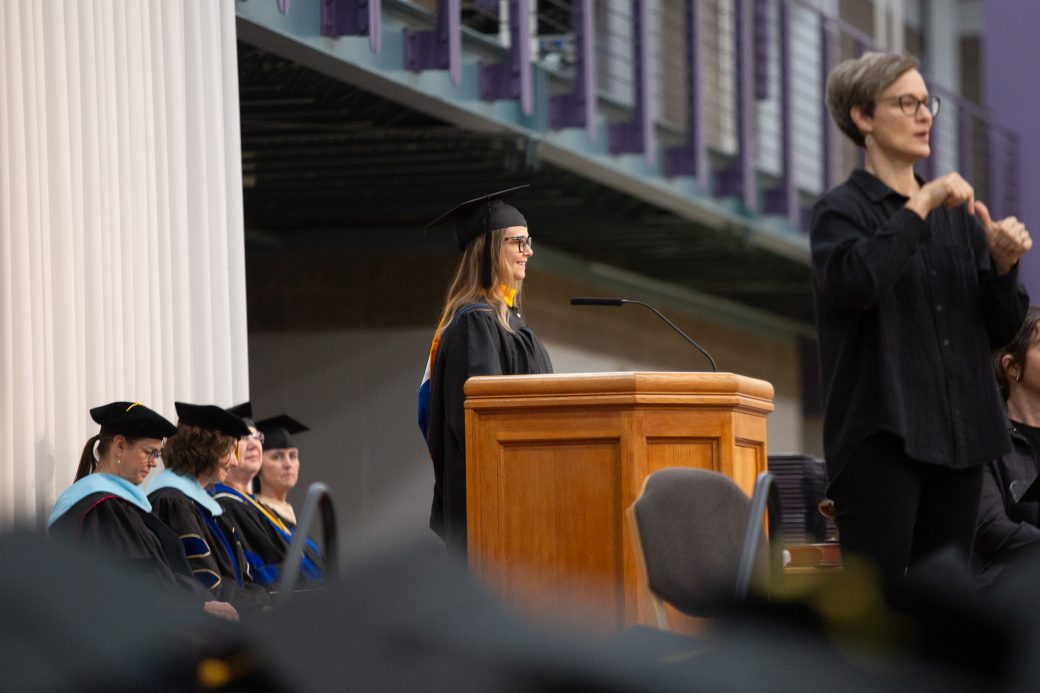 Shannan Martin speaking on stage at GC's graduation