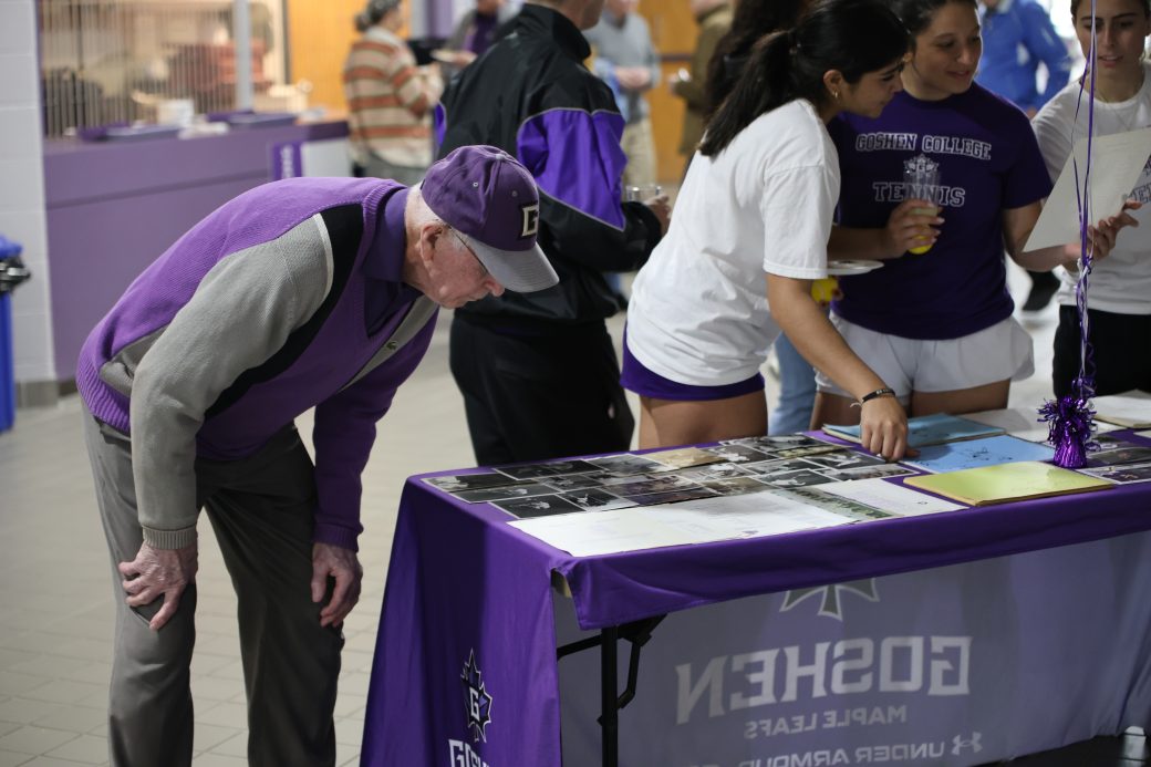 Man looking at photos
