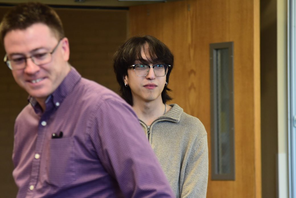 Close up of student entering classroom