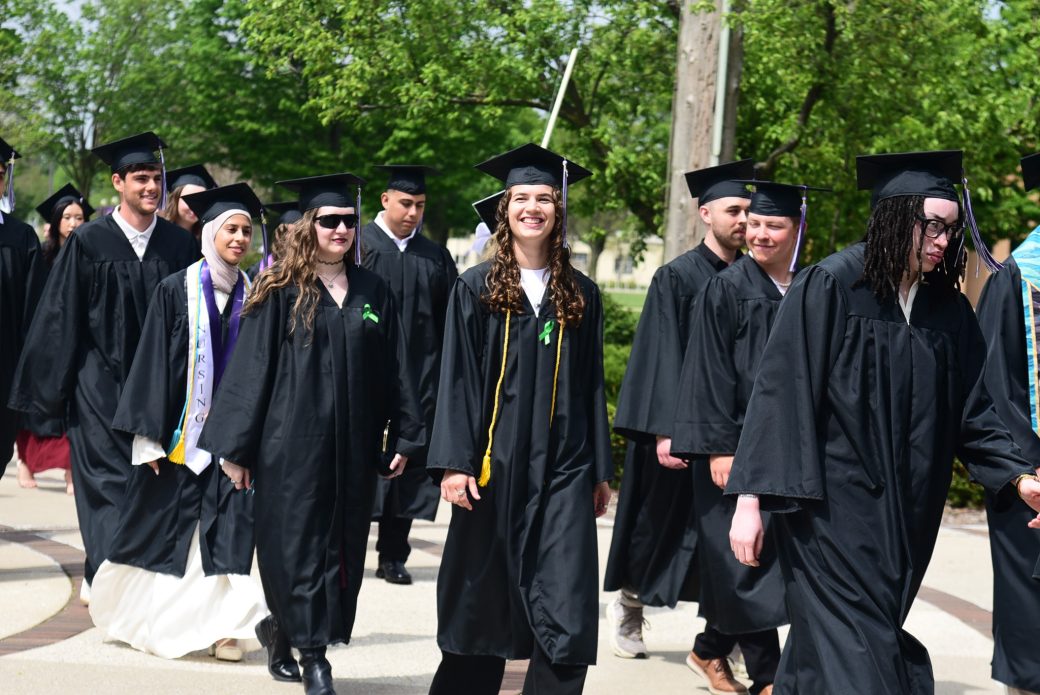 Female graduate smiling for photo