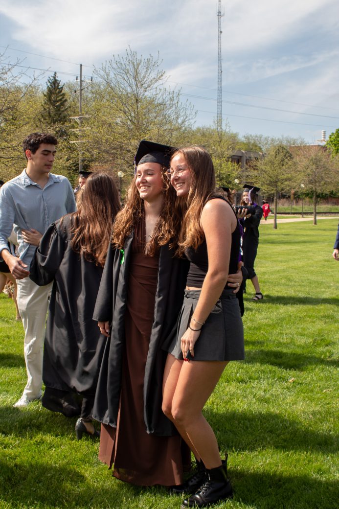 Happy graduate with friend