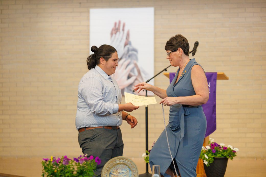 Jewel Yoder giving certificate to award winner