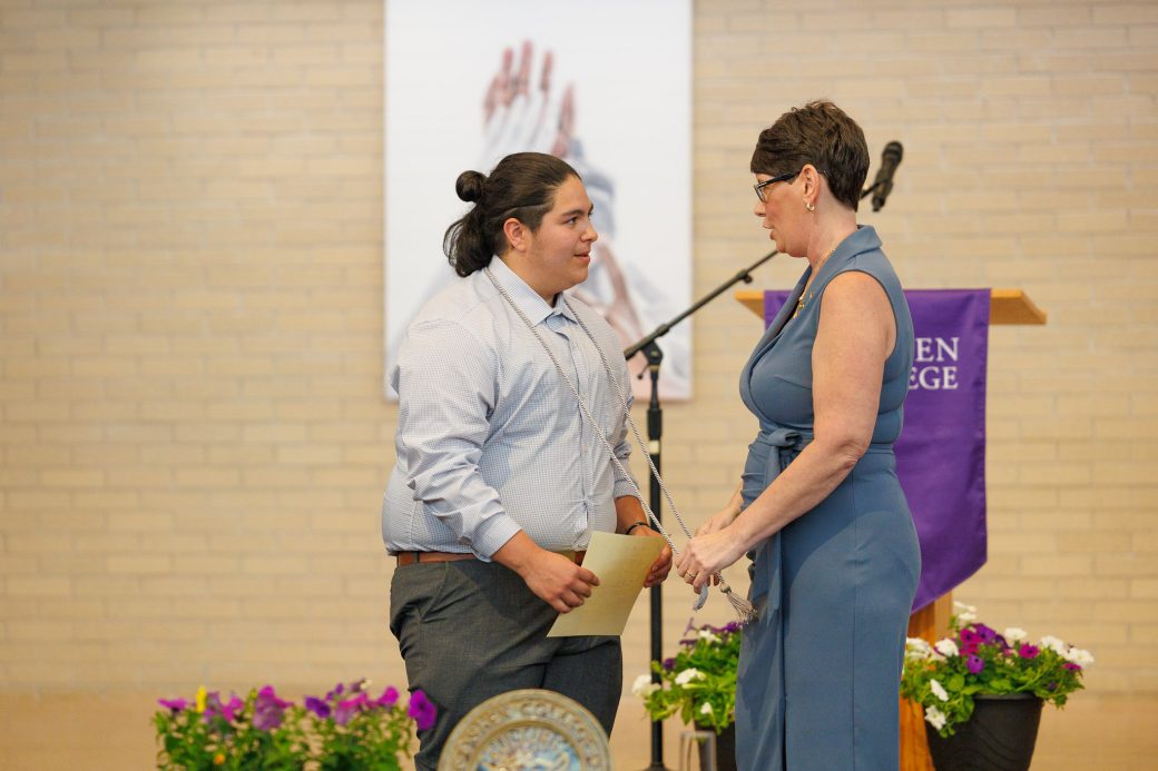 Jewel Yoder congratulating student winner