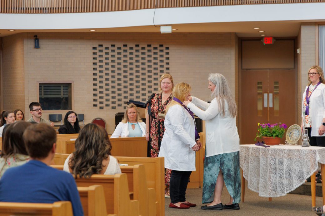 MSN graduate receiving pin