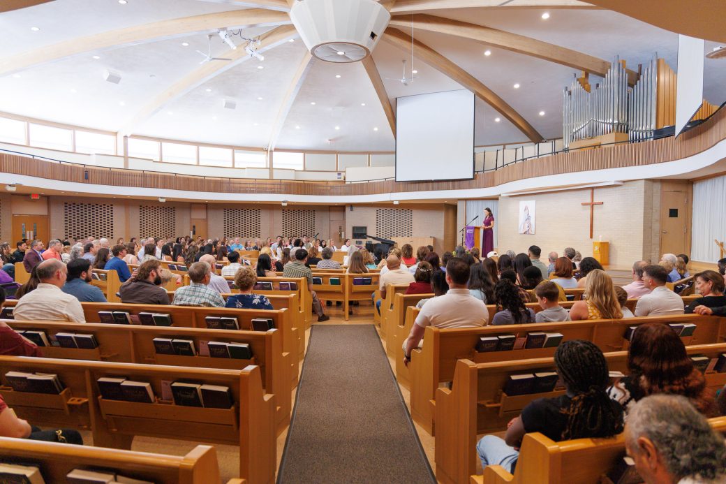 Goshen College church chapel full with guests for Nurses' Pinning Ceremony