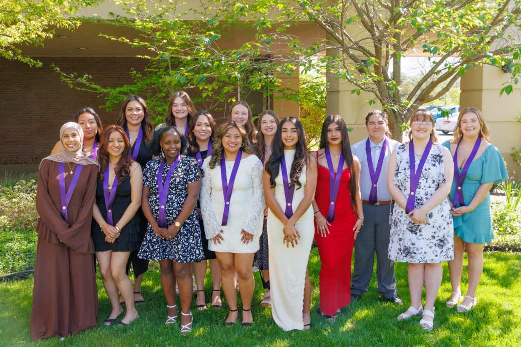 2026 Goshen College nursing graduates posing outside for photo