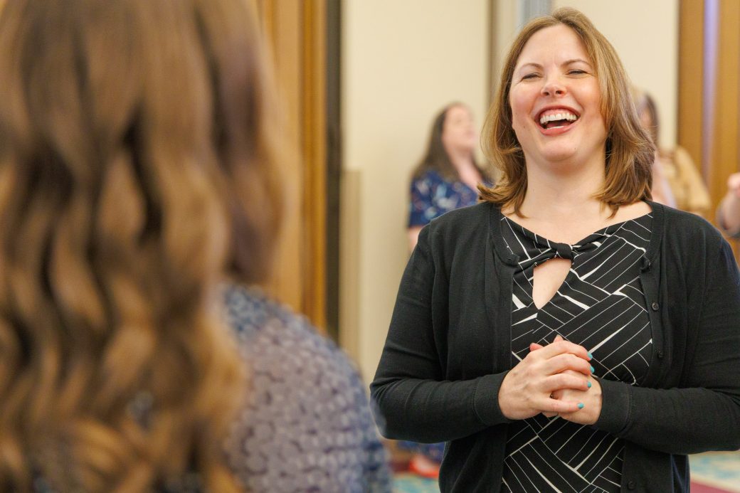 Nursing faculty smiling and laughing