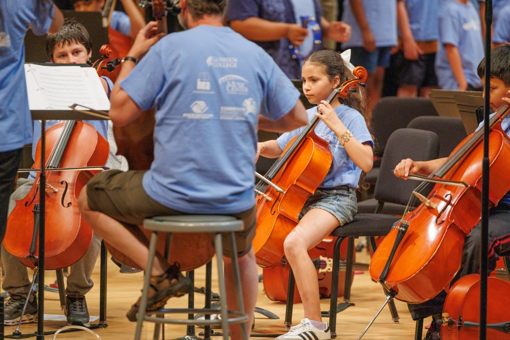 CLose of of student playing cello