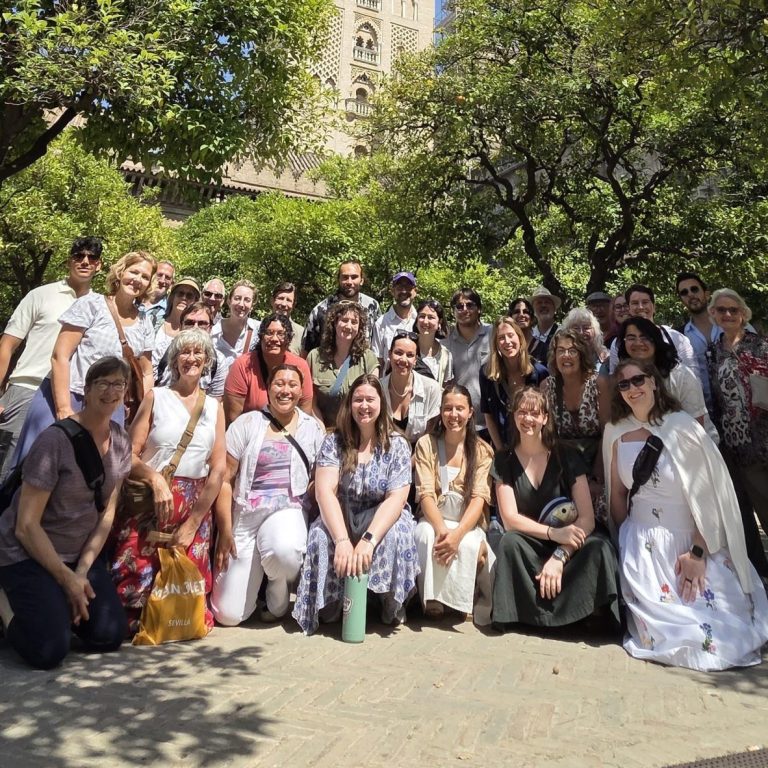 the Spain/Portugal choir tour cohort in front of a cathedral in Spain.