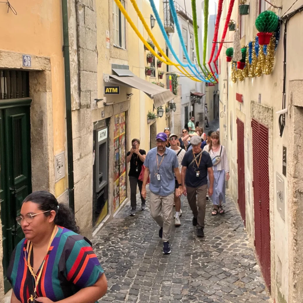 the Spain and Portugal choir cohort walking through Lisbon