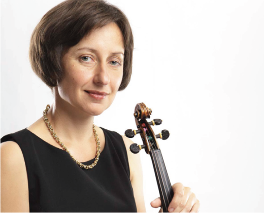 professional headshot of solomia soroka posing with a violin