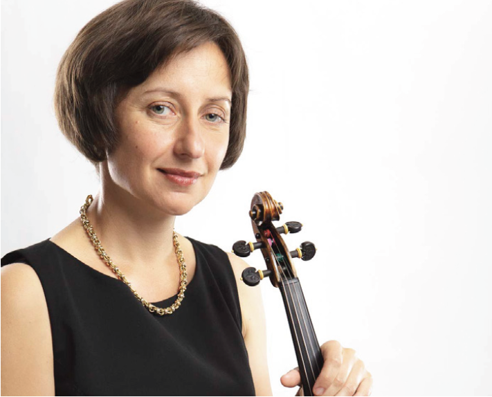 professional headshot of solomia soroka posing with a violin