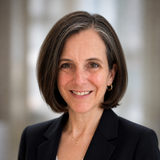 Yvonne Zimmerman presidential headshot wearing a white blouse and black blazer